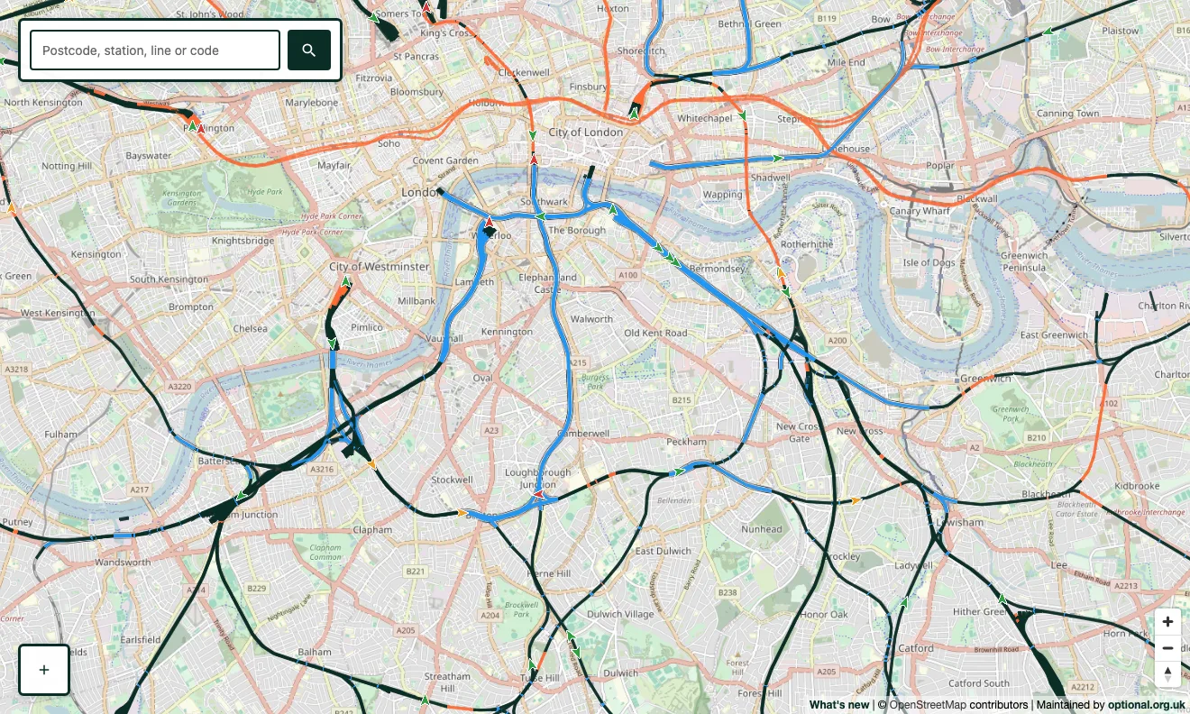 Live trains moving across the London rail network, shown as arrows coloured green, amber and red by punctuality